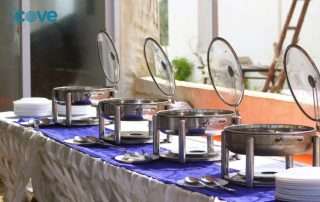 Corporate dinner at The Cove Resort & Restaurant featuring gourmet food, beachside views, and engaging activities
