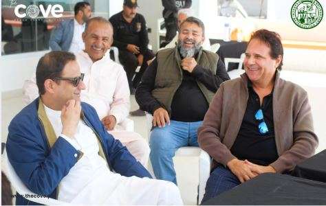 The Cove Beach Resort Murtaza Wahab receives The Cove Beach Resort plaque from Reza Samad at the ceremony